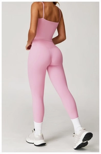 Close-up of pink brushed yoga top with double straps and smooth ergonomic stitching