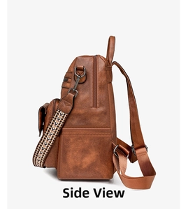 Side view of vintage brown leather backpack featuring a bohemian style woven shoulder strap