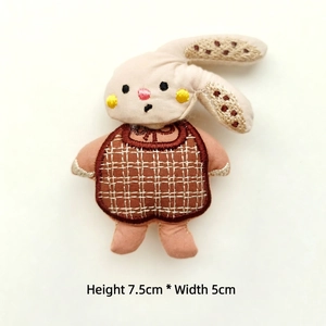 Close-up of handmade embroidered rabbit doll with dimensions H7.5cm x W5cm for DIY crafts