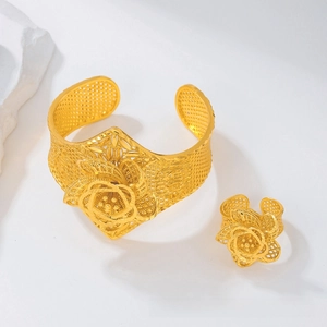 Exquisite hollow rose flower gold bangle and ring set with intricate filigree details