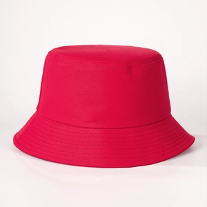 Detail of red cotton bucket hat showing parallel stitching and high-density twill fabric