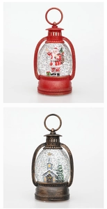 Detail of Christmas lantern with Santa and church scenes featuring falling snow effect