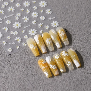 3D embossed daisy nail stickers and yellow gradient press-on nails with floral art