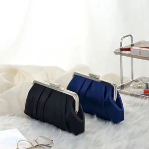 Elegant satin evening clutch bags with pleats and diamond buckles in black and blue