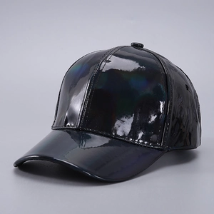 Detail shot of black patent leather baseball cap with glossy holographic finish and sun visor
