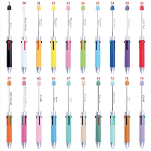 Detailed close-up of colorful DIY beadable ballpoint pens in twenty different plastic finishes