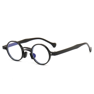 Occhiali da sole vintage neri a montatura rotonda con doppio ponte e lenti anti-luce blu