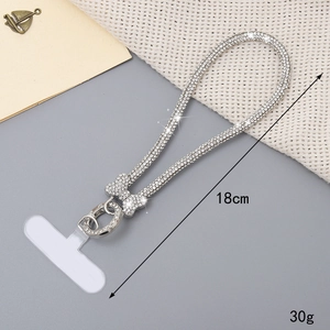 Universal silver chain phone strap with rhinestones and bow detail, 18cm long
