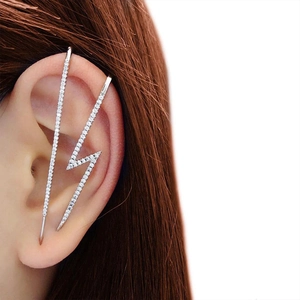 Close-up of S925 sterling silver lightning bolt ear crawler with sparkling cubic zirconia