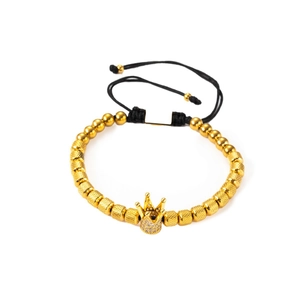 Gold crown pendant beaded bracelet with black woven rope and adjustable slider