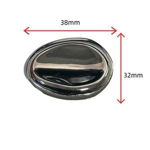 Detailed macro view showing the 38mm by 32mm dimensions of the dark grey oval brooch