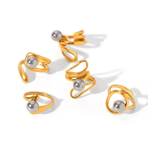 Set of five gold titanium steel rings with grey pearls in various geometric shapes