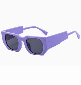 Detail view of purple thick-frame sunglasses with bold temples and geometric cut