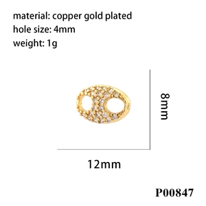 Detailed macro view of 18K gold plated copper pig nose connector with CZ zircon stones