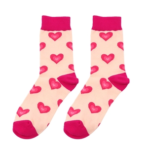 Detail of pink cotton crew socks featuring dark pink heart patterns and contrasting heel