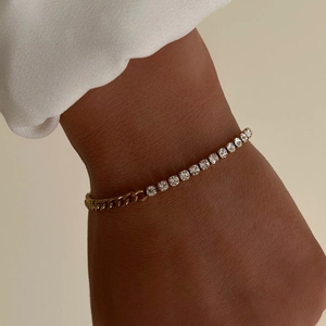 Layered 18k gold plated titanium steel Cuban chain and tennis bracelet on model wrist
