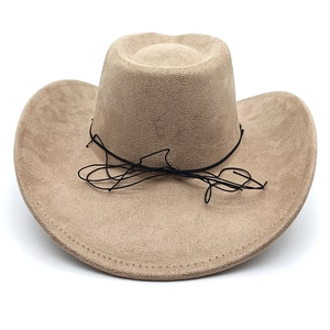 Detail view of khaki faux suede western cowboy hat with curved brim and black rope trim