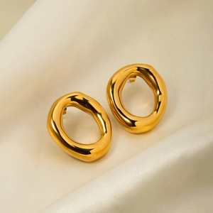 18k gold plated stainless steel hollow oval hoop earrings on white silk background