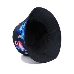 Reversible bucket hat with flamingo and blue forest print on high-quality black canvas fabric
