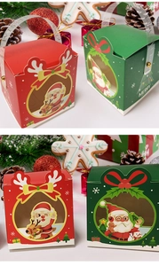 Detailed view of Christmas gift boxes with festive illustrations and ribbon handles