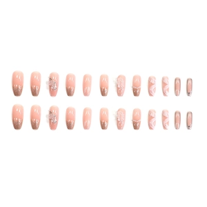 Detail of 24pcs peach pink press-on nails with 3D butterflies and pearl accents