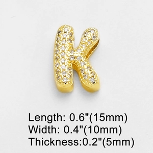 Detail showing 15x10x5mm dimensions for gold letter K pendant with zircon pavé