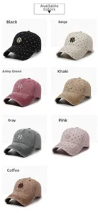 Detail view of washed cotton baseball caps in seven vintage colors with polka dot embroidery