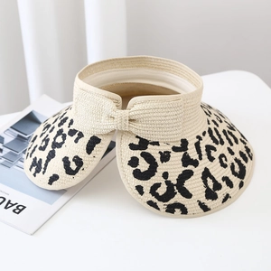 Women's leopard print open top straw sun hat with bow detail and adjustable wide brim
