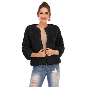 Detailed texture of black faux fur material on a stylish short women's round neck jacket