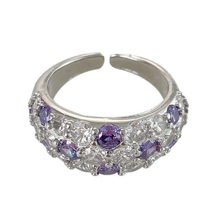 18K gold plated open ring featuring purple and white zircon stones on white background
