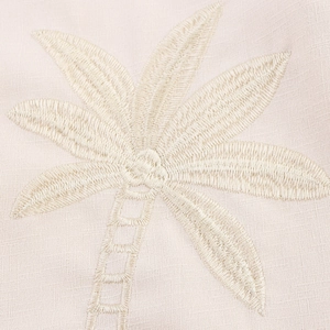 Women's summer crop shirt with detailed palm tree embroidery on cream fabric
