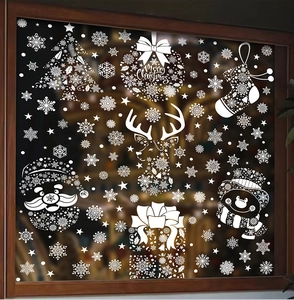 Détails d'autocollants de Noël blancs avec Père Noël, rennes et flocons de neige