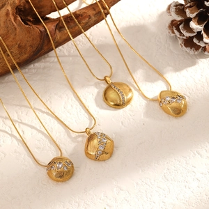 18k gold plated stainless steel necklaces with zircon pendants in a rustic natural setting