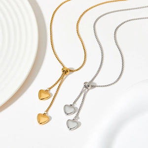 Polished gold and silver stainless steel heart Y-necklace with adjustable sliding chain