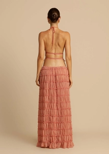 Detail of coral chiffon halter top back with tie closure and pleated texture finish