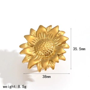 Detail view of 18k gold plated stainless steel sunflower earrings with dimensions 35.5x38mm