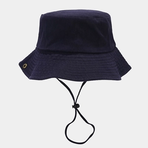 Foldable washed cotton bucket hat in navy blue with adjustable chin strap and flat top