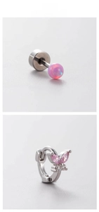 Detail of pink opal stud and crystal butterfly earring in high-quality titanium steel