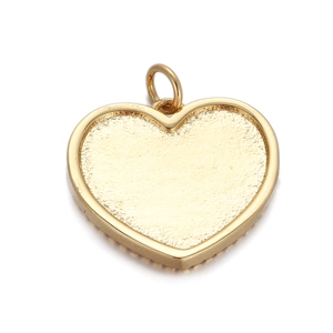 Detailed view of 14K gold-plated textured heart wing pendant with a smooth polished edge