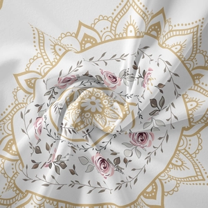 Detail of soft cotton mandala tapestry with golden patterns and pink floral accents
