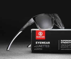 Detail of polarized sports sunglasses with black to transparent gradient frames and box