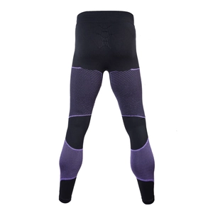 Detail view of compression leggings with purple muscle support zones and seamless knit texture