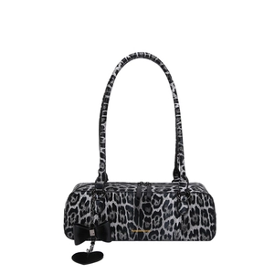 Gray leopard print shoulder bag with long handles and a decorative bow charm on white background