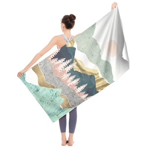 Microfiber beach towel with abstract landscape art of pink forests and golden mountains