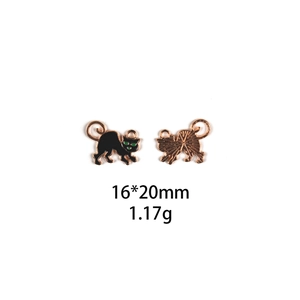 Detailed view of cat alloy pendants showing front black enamel and rose gold back 16x20mm