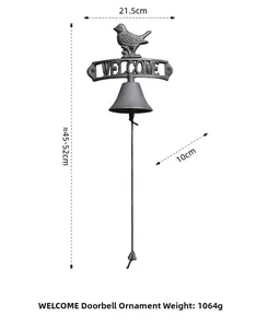 Close-up of rustic cast iron welcome door bell with decorative bird and 21.5cm width