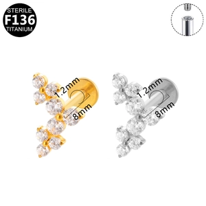 Detail of G23 F136 titanium labret studs with star zircon and internal thread design