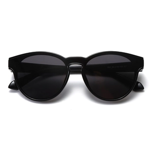 Classic polarized travel sunglasses with black lightweight frames and dark lenses