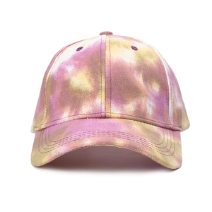 Detail of tie-dye baseball cap with metallic purple and pink reflective finish