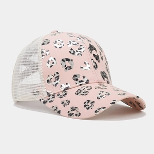 Detail view of pink leopard print trucker hat with breathable mesh back and curved brim